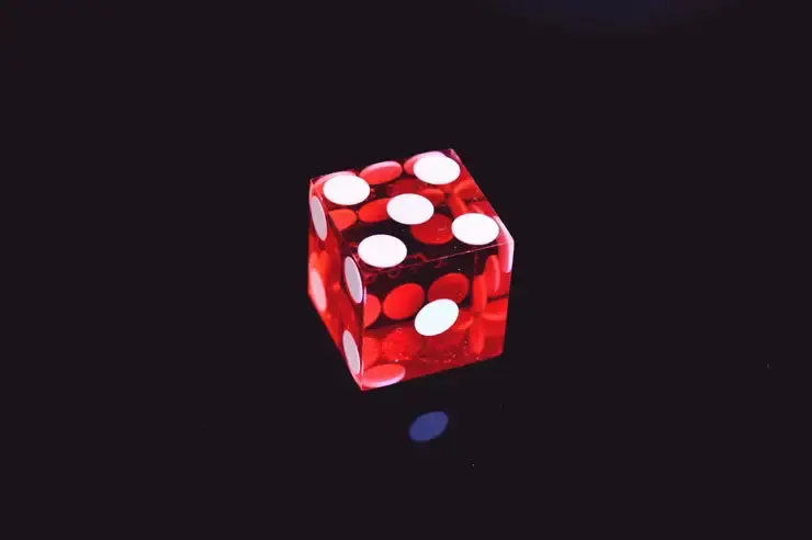 red die with five side up